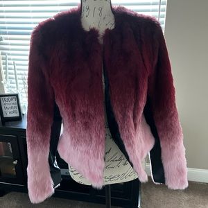 New with tags pink and maroon fur jacket with black leather detail on sleeves.